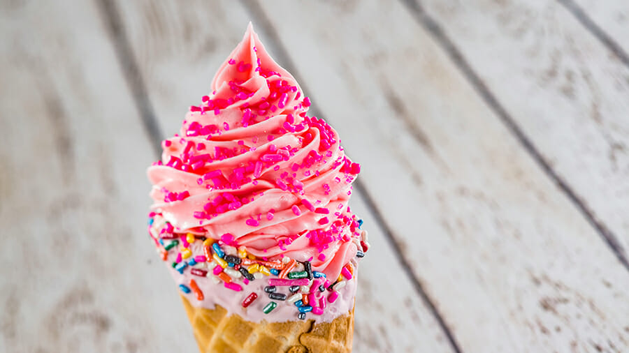 Shimmering Strawberry Soft-Serve in a Waffle Cone